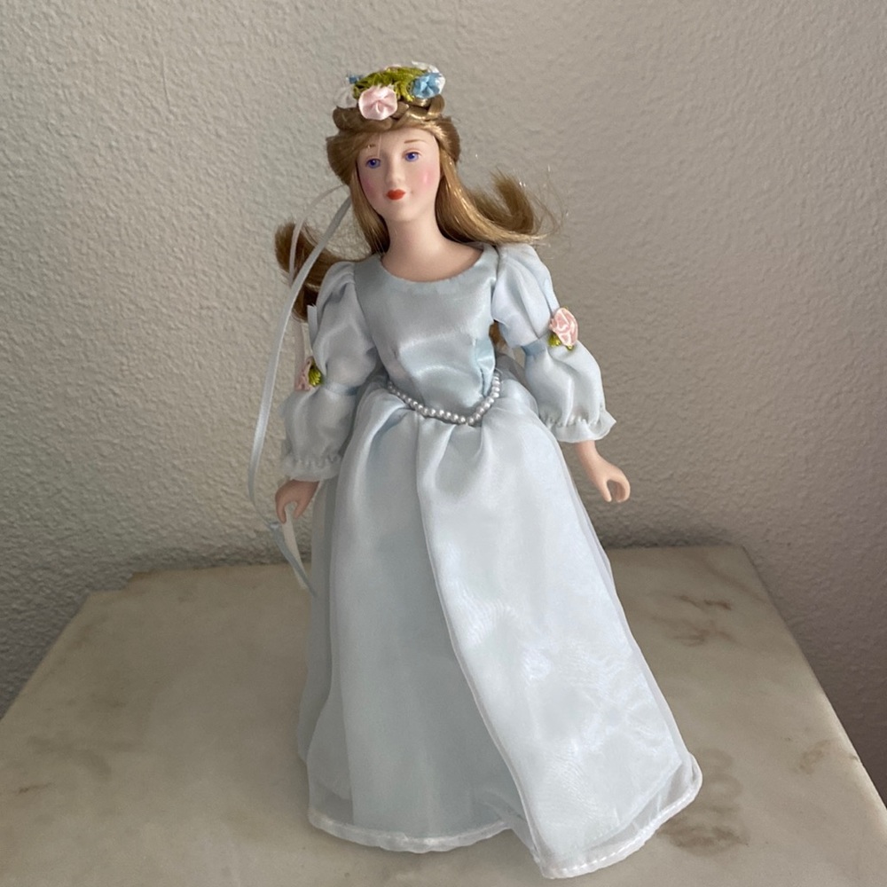 Vintage porcelain doll Cinderella with stand